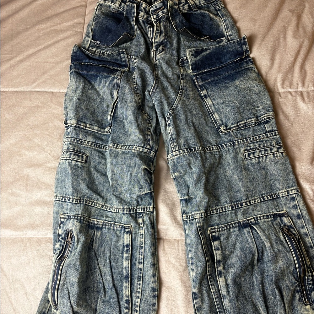 Blue Boyfriend Jeans with Distressing and Embellishments